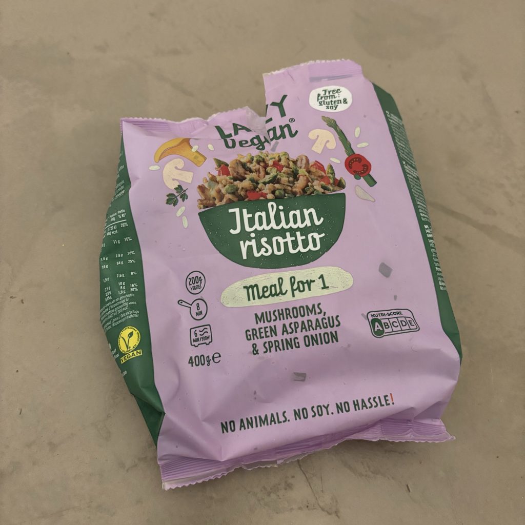 Opened Lazy Vegan bag containing an Italian risotto meal for one.