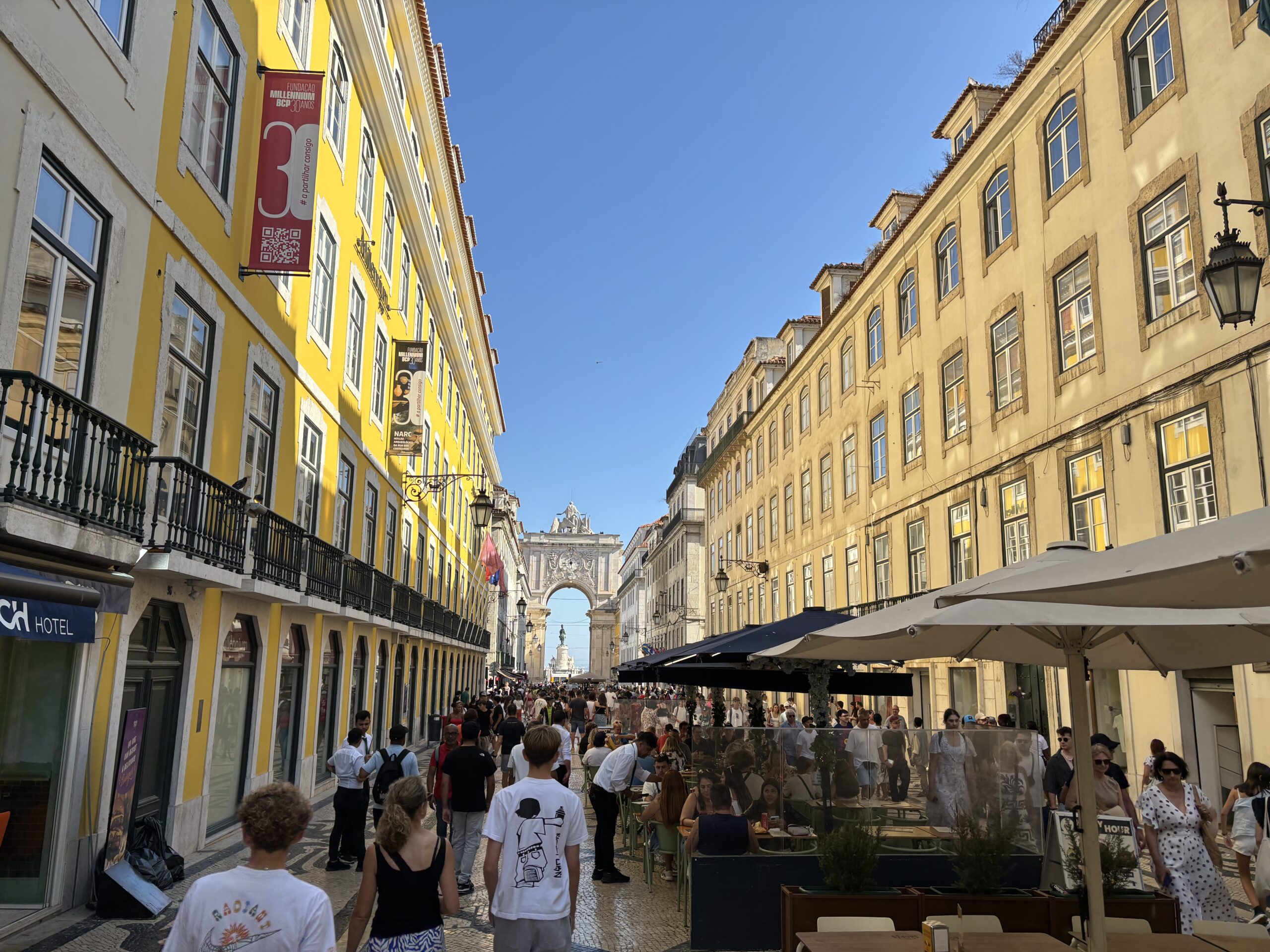 Looking south down the busy, restaurant-filled Rua Augusta towards the Arch
