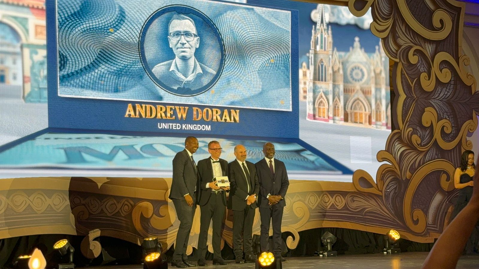 Receiving my award with some of the senior leaders of our firm. Photo: Amrin Mamad Moreira