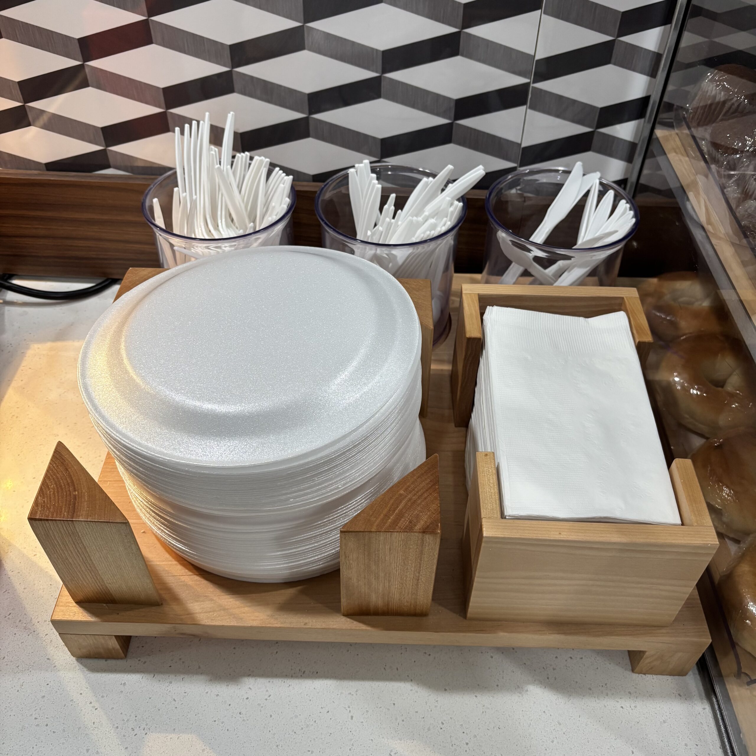 Styrofoam plates at the hotel breakfast buffet.