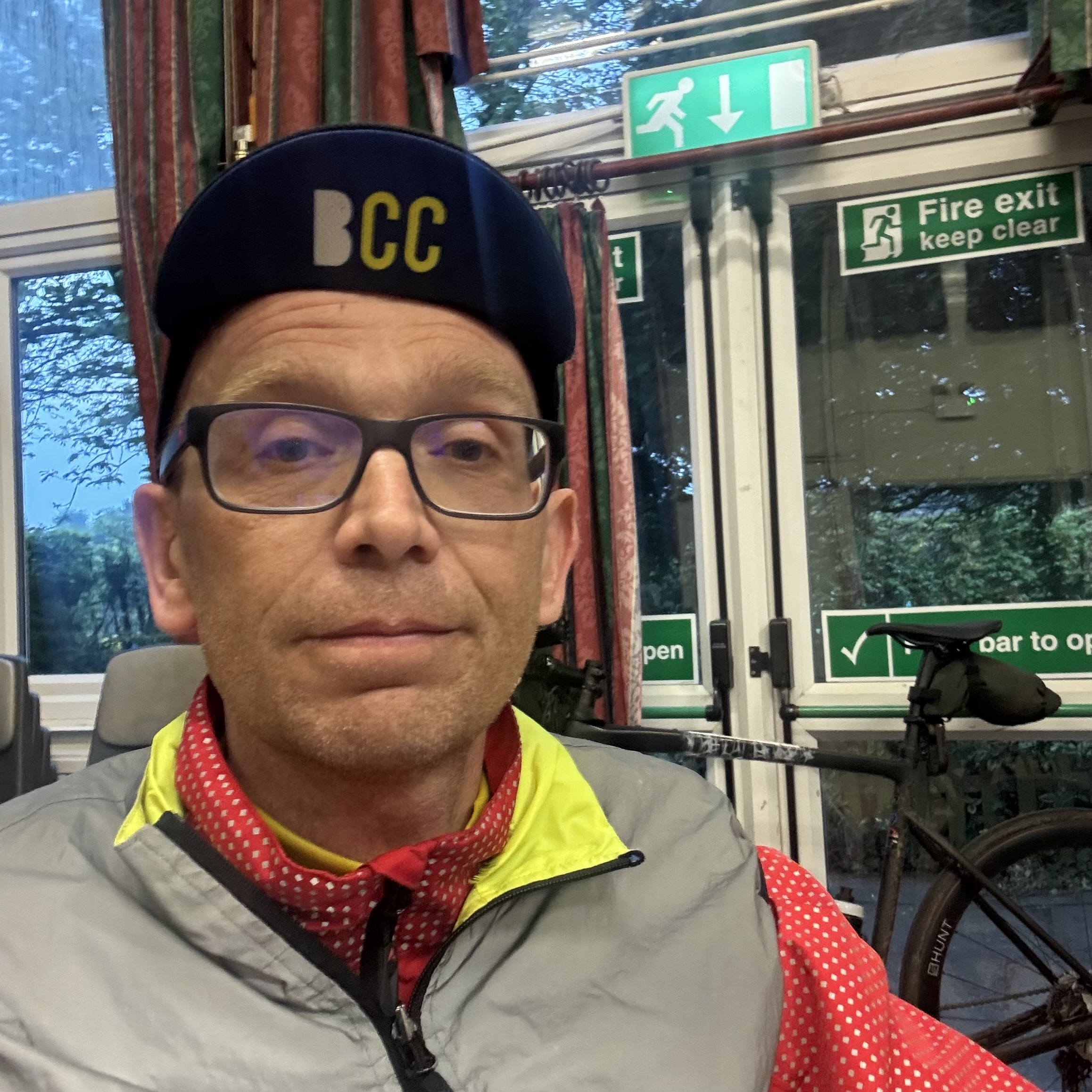 Me, at 5:48am in Chalfont St Peter Community Centre, having just finished the 2026 London Wales London bike ride.
