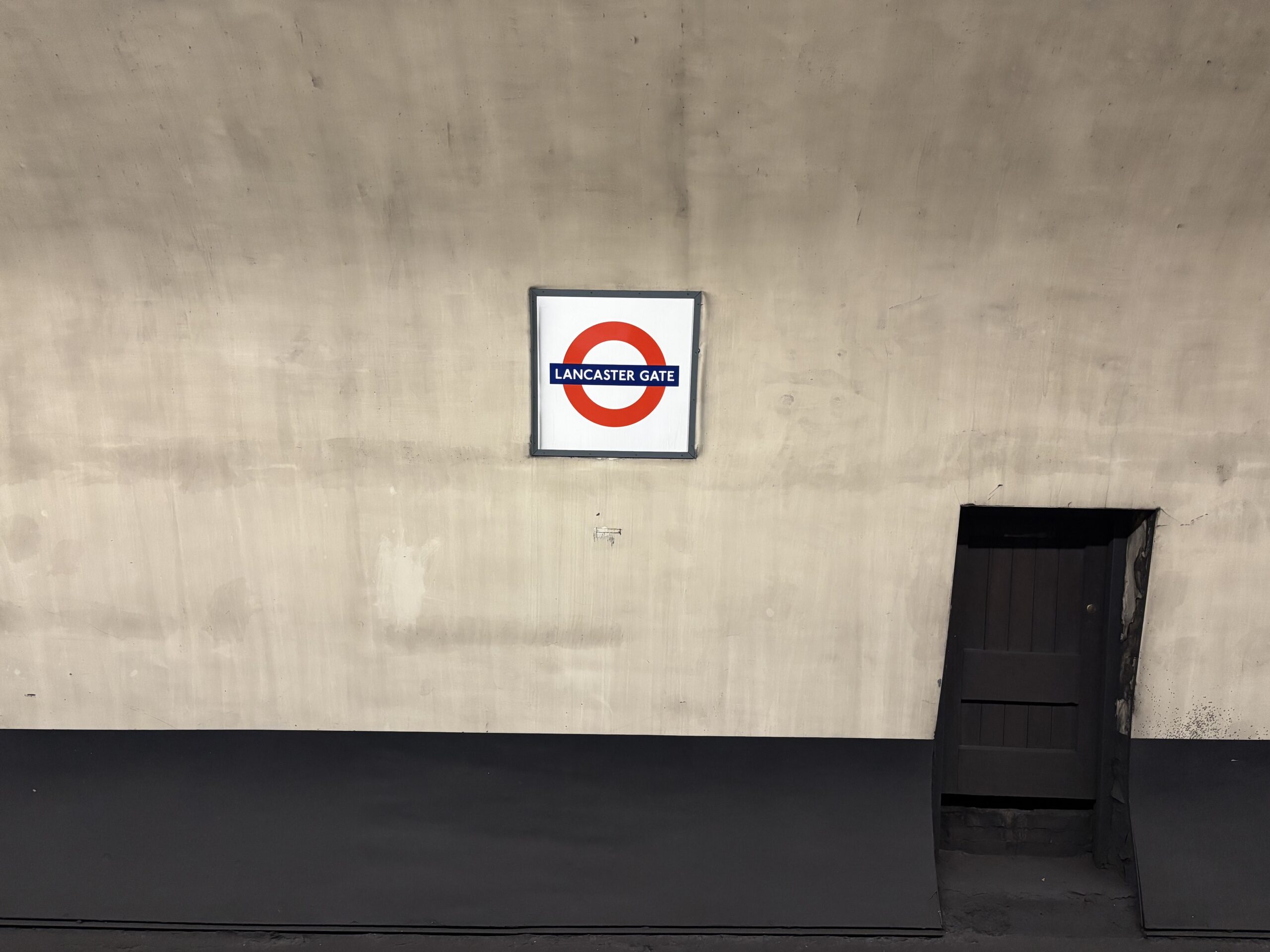 An intriguing, ill-fitting door in the wall at Lancaster Gate tube station. Who knows what is hidden behind it?